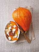 Pumpkin gratin with sheep's cheese, onions and rosemary