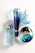 4 Parfumflakons: Calvin Klein, Davidoff, Azzaro, Boucheron, blau, lila