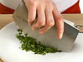 Chopping herbs with mezzaluna, step 5