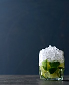 Ti punch with lime and crushed ice in glass