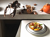 Lobster fricassee with chestnut and pumpkin in plate