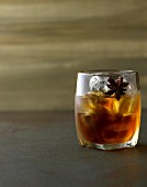 A maple and cardamom Old Fashioned: cocktail with whiskey, anise and maple syrup