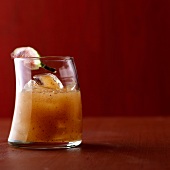 Whiskey Sour with figs and vanilla in glass
