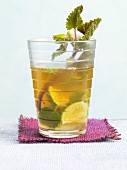 Mint tea Mojito with a sprig of peppermint and limes
