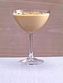 Spicy chocolate flip with speculoos in glass