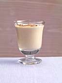 Karabanana with banana coconut milk and cinnamon powder in glass