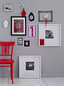 Pictures of various formats on grey wall