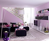 Living room in black and pink with couch and cabinets
