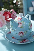 Blue teapot with rose pattern