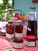 Rose jelly and rose blossom syrup filled in jars