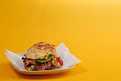 Pita bread with steak and salad in serving dish