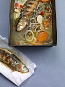 Portuguese style grilled sardines in vegetable soup