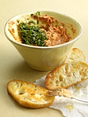 Vegetable dip with parmesan cheese in bowl, ciabatta breads