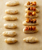 Nuts on marzipans for preparation of pralines