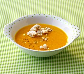 Bowl of coconut and pumpkin soup