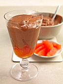 Glass of chocolate mousse with grapefruit 