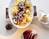 Farfalle with gorgonzola, fig sauce and radicchio in serving dish