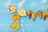 Five avocado ice-creams in bowl with ice-cream cone