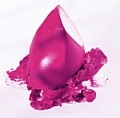 Farbklecks eines abgebrochenen Lippenstiftes in Pink