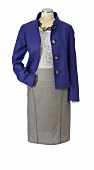 Pailletten top, gray skirt and blue jacket on mannequin against white background