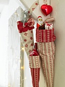 Close-up of red and white cornets with gifts