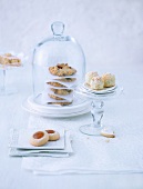Cranberry cookies, coconut balls and walnut in glass bell