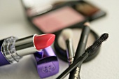 Close-up of lipstick, mascara, eye shadow, eyeliner and blush
