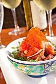 Close-up of sashimi salad with tuna and caviar in bowl