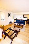Long armchair and couch in living room of Hotel Casa Morada in Islamorada, Florida, USA