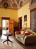 View of sofas and frescoes in Villa Lemura at Panicale, Umbria, Italy