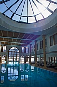 Swimming pool and loungers at Hotel A-Rosa Grand Spa Resort, Kitzbuhel, Tyrol, Austria