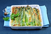 Baked asparagus with basil in serving dish