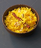 Saffron and almonds rice in bowl