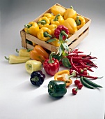 Wooden crate of bell peppers and hot peppers