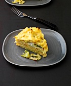 Piece pancake with savoy cabbage on plate