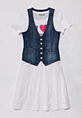 Denim vest with white skirt and top on white background