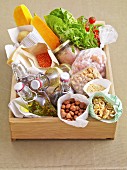 A box of various salad ingredients