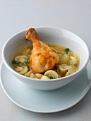 Chicken gravy with mushroom in bowl