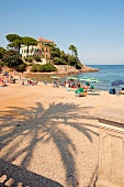 People enjoying at dream beach in Cavo, Elba, Italy