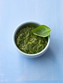 Fresh basil pesto sauce in bowl