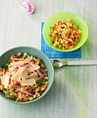 Carrot risotto with rice, peas and ham in bowl
