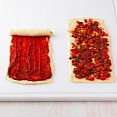 Preparation for pizzaschnecken on white board, step 2