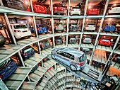 View of new car on hydraulic lift in car towers at Autostadt, Wolfsburg, Germany