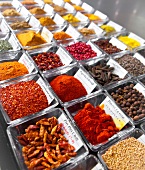 Various spices in glass bowls