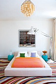 Bedroom with retro style colourful patterned carpet in leather