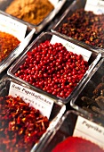 Various spices in glass bowls