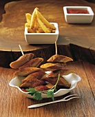 Currywurst with French fries in serving dish, Berlin