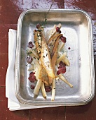 Salsify with fried char on steel dish