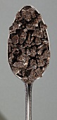 Ein Löffel mit "Molasses" Zuckerkristallen