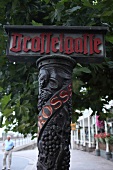 Old signboard with Drosselgasse inscription in Rudesheim, Germany